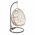 Chaise suspendue en rotin avec coussins crème